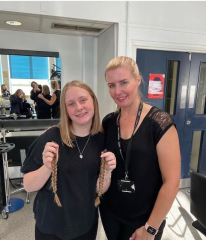 Student has hair cut off for children's cancer charity